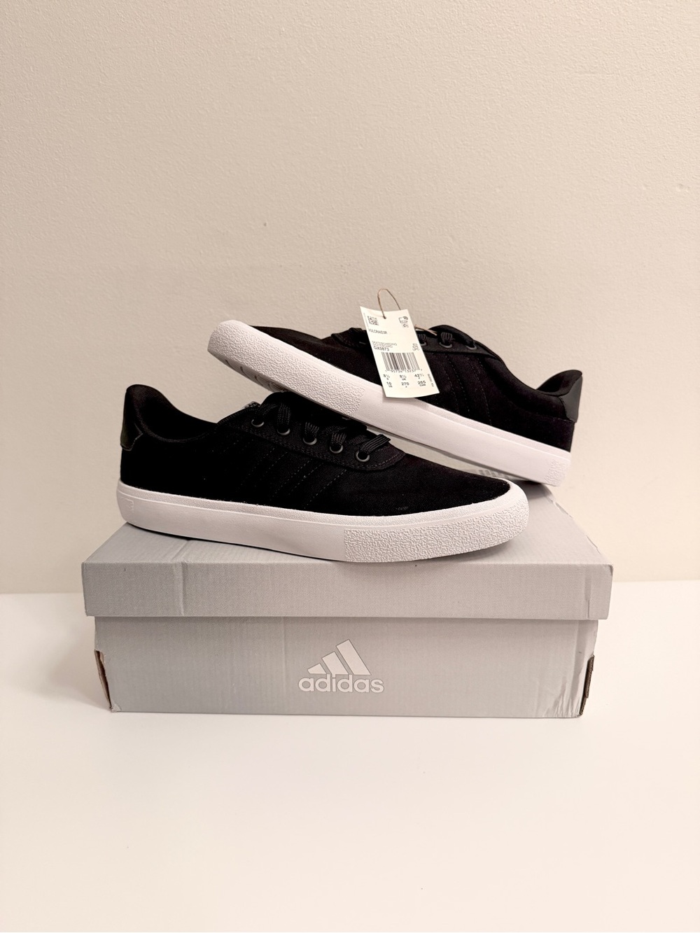 adidas women’s Black Sneakers with White Sole